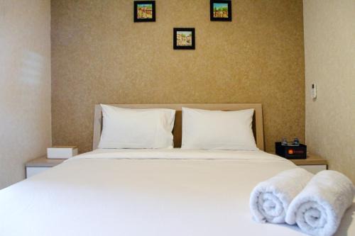 Bekasi Barat Wohnung | Minimalist and Comfy 1BR Grand Kamala Lagoon Apartment By Travelio
