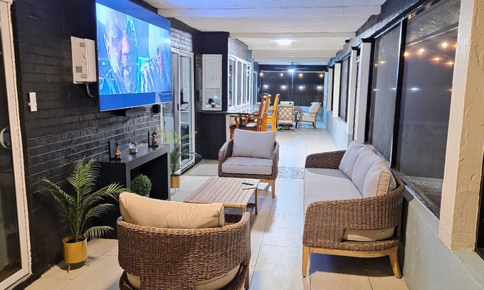 Port Saint Lucie Haus | Modern 3BDR Boho Home with backyard and impact windows.