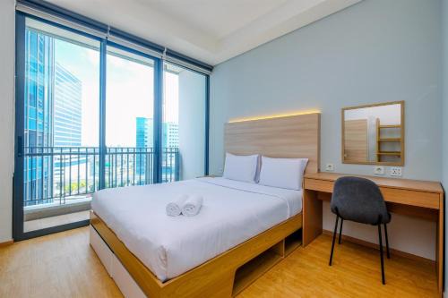 Mampang Prapatan Wohnung | Modern and New 1BR across LRT Station Samara Suites Apartment By Travelio