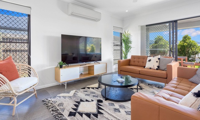 Trinity Beach Haus | Modern Home with Private Spa and Fenced Garden