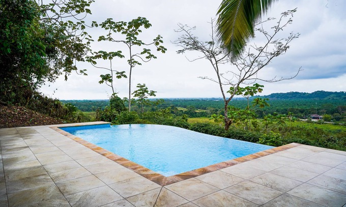 Quepos Haus | Mountain-view home with private infinity pool & outdoor shower - dog-friendly