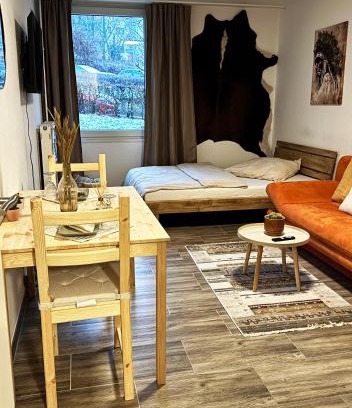 Am Homburg Wohnung | Nähe Uni Campus inklusive Parkplatz Boho-Suite by Rentigo - Perfekt für einen Aufenthalt in Zentrumnähe!