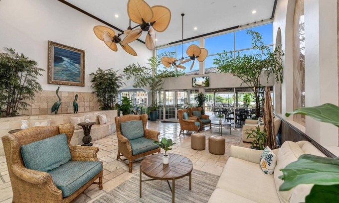 Redevelopment Area Resort | Naples Bay Retreat: 4 Comfortable Units with Bay View! Outdoor Pool & Hot Tub!