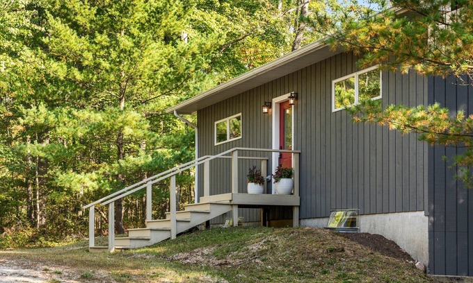Big Rapids Haus | Nestled in the woods, this private detached Guest House is a perfect getaway!
