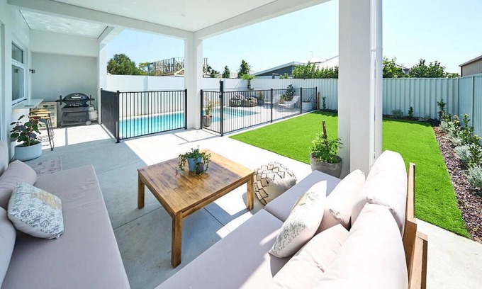 Bouvet Island Haus | New Luxury Home with pool - Sleeps 12 walking distance to shops & beaches!