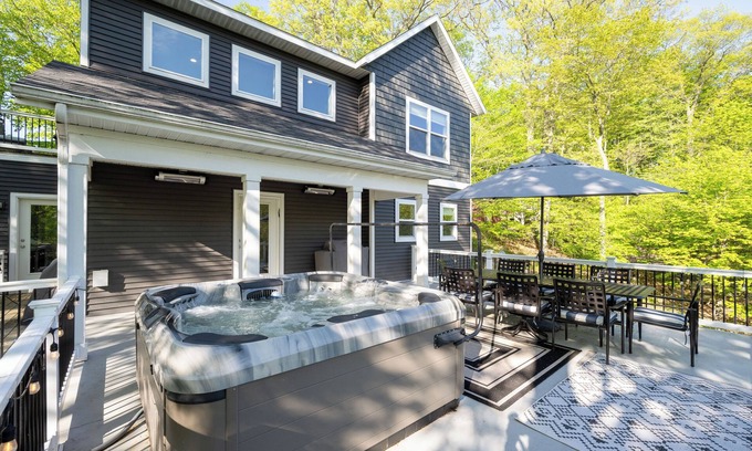 West Olive Haus | Newly Listed! Stunning views and gracious living