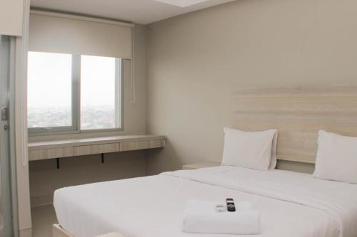 Duren Sawit Wohnung | Nice Studio at Gateway Park LRT City Jatibening Apartment By Travelio
