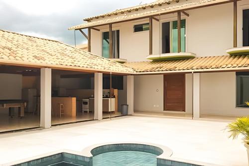 Bom Pastor Haus | NossoApê Guarua: Piscina | Churrasqueira | Ar-condicionado