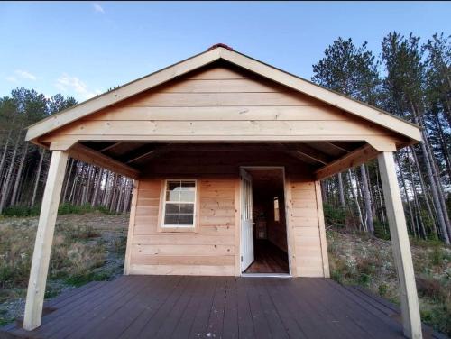 Grand Isle Haus | Off-Grid Cabin Nestled Among Nature with Lovely Landscape Views in Maine