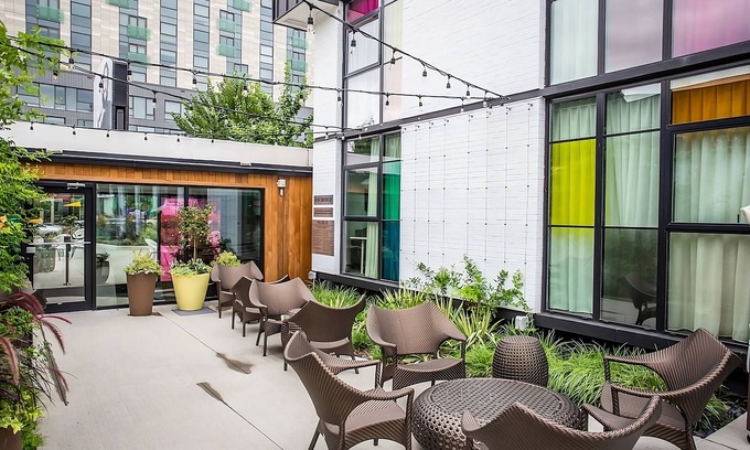 West Fens Hotel | Pet Friendly Triple King Trailers w/ Courtyard Pool, & Onsite Dining & Bar!