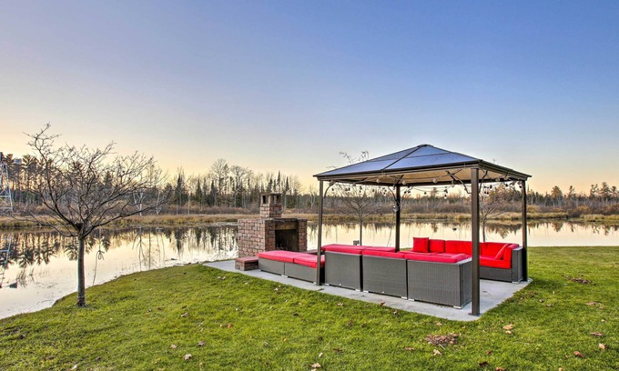 Northeast Michigan Haus | Private Cadillac Gem w/ Kayaks, Hot Tub, Pond, Pool Table and More