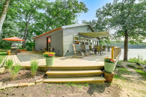Smyrna Haus | Private Island Home in Belding with Dock and Grill!