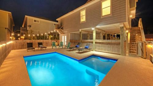 Port Aransas Haus | Private Pool Game Room Patio Near the Beach Palm House by AvantStay