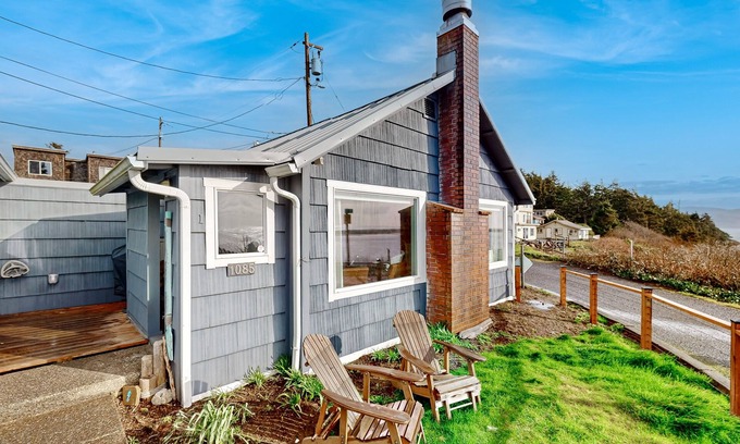 Netarts Haus | Quaint oceanfront hideaway with open layout, fireplace, central AC, & gas grill