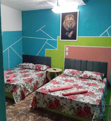 Aparecida Haus | Quarto, garagem, portão automático, banheiro, wi-fi, tv, frigobar e ventilador de teto