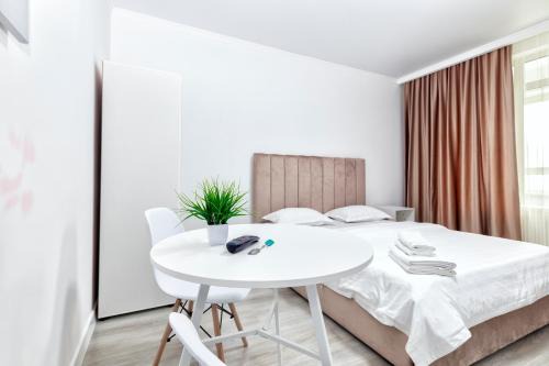 Nur-Sultan Wohnung | RAISSON APARTHOTEL AM96 Хан Шатыр