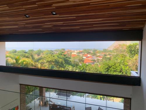 Itacoatiara Haus | Refúgio com vista mar e verde