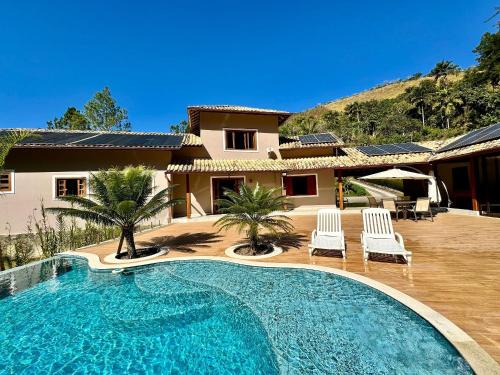 Olaria Haus | Refúgio em Lumiar: Piscina Aquecida, Área Gourmet e Rio Privado