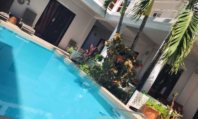 Caye Caulker Wohnung | Relax and Unwind in Our Serene Poolside Studio Retreat!"