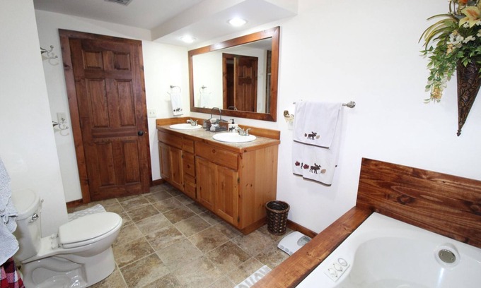 Grayling Haus | Relax, Unwind and Enjoy. Rustic log cabin with private Au Sable River Frontage!