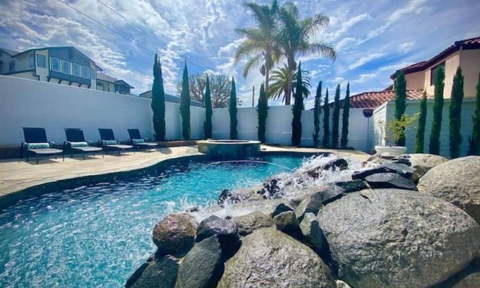 Fire Mountain Haus | Resort Style Home with Hot Jacuzzi, Relaxing Pool & Patio and Cozy Living Spaces