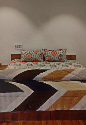 Shamshi Haus | River side cafe guest cottage