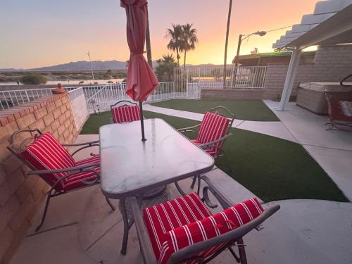 Bullhead City Haus | RIVERFRONT RUBY RED HOME WITH PRIVATE DOCK