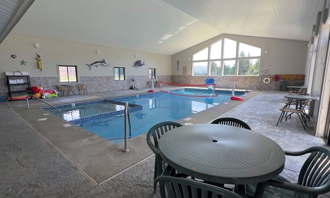 Alger Haus | Riverside Romance: Couple Getaway with Cozy Tavern Dining & Indoor Pool Access