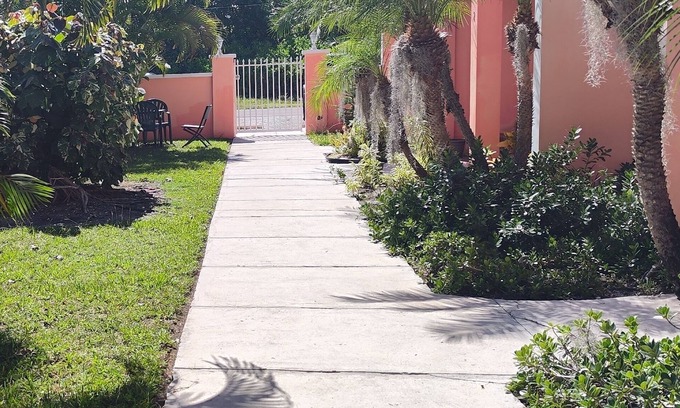 Coral Harbour Haus | Romantic Getaways or Family fun. Enjoy Island Vibes at 2BR Townhome Near Beach!