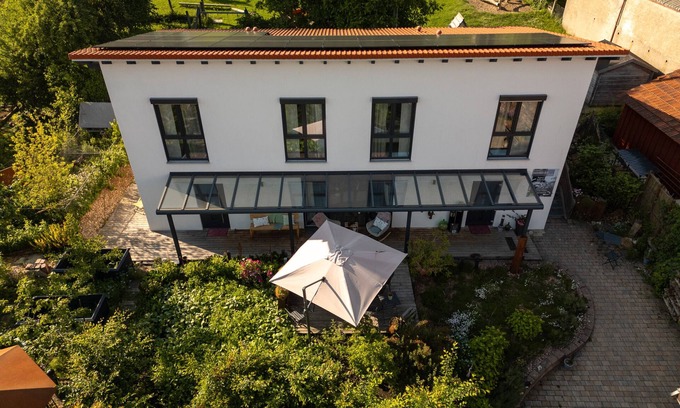 Bad Urach Wohnung | Zimmer 'Nr. 4' mit gemeinsamer Terrasse, Gemeinschaftsgarten und WLAN