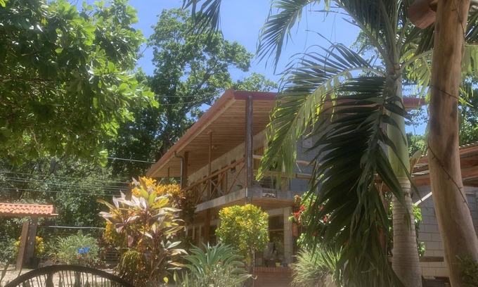 Marbella Kabine | Rustic jungle lodge in a tranquil garden setting - Room 6 Family room