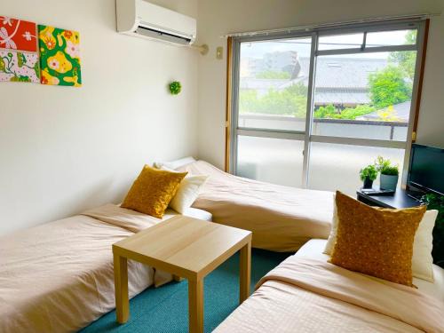 Toyonaka Wohnung | Sakura202 伊丹空港アクセス抜群タイニールーム最大3名宿泊可能