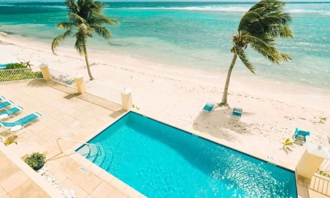 Bodden Town Eigentumswohnung | Seabreeze Villas, Superb Beachfront Views from 229/night. Rental Car Included!