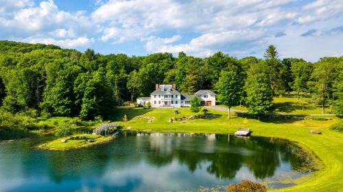 Austerlitz Haus | Secluded Berkshires Estate Private PondPoolTheater Gym Sunny Pond