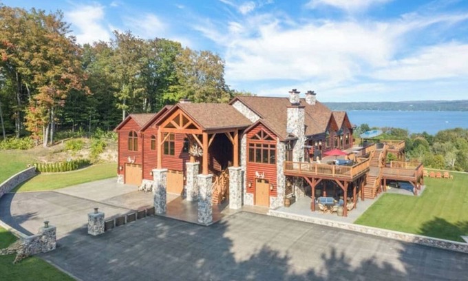 Kewadin Haus | Secluded Luxury Lodge Overlooking Torch Lake with Hot Tub, Elevator on Hilltop!