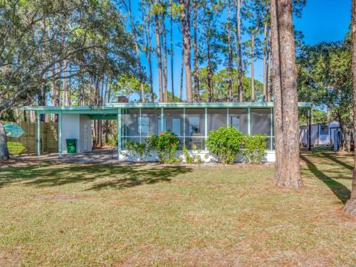 Panacea Haus | Shoreline Serenity- The Golden Goat On The Bay