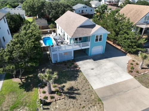 Colington Haus | Somewhere On A Beach - 4 bedroom -Private Pool - Hot Tub - Fire Pit - Game Room - Horseshoe Pits - Walk to beach, Sound, arcade and go carts!