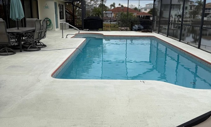 Spring Hill Haus | Spacious 4BR Waterfront Home w/ Heated Pool, Dock & Gulf Access, Sleeps 14+