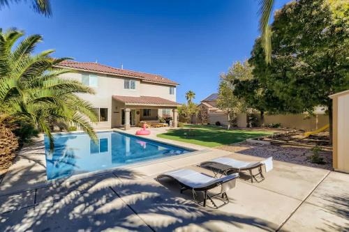 Rhodes Ranch Haus | Spacious Luxury Desert Retreat with Heated Pool Putt putt and a playground for family