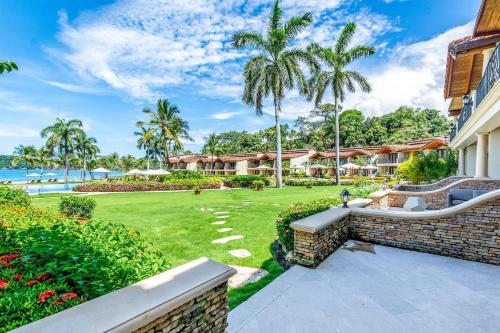 Playa Flamingo Haus | Spacious Open-Concept Condo with Stylish Design, Direct Beach Access & Resort-Style Amenities