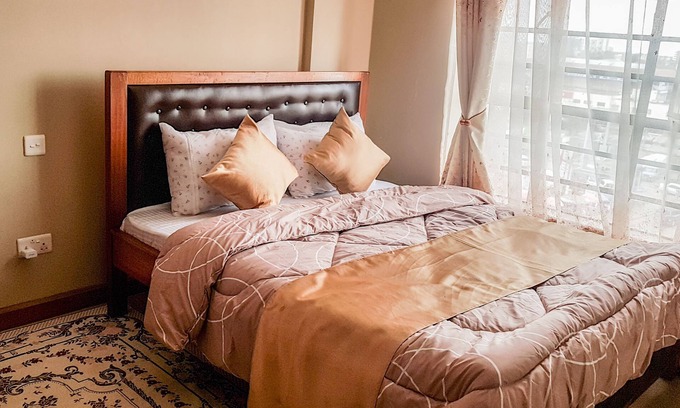 Langata Wohnung | Studio mit Kingsize-Bett, Aufzug, WIFI & Parkplatz in der Nähe von City, JKIA & Wilson Airport.