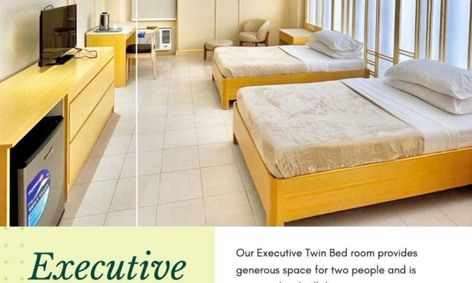 Downtown Tacloban Wohnung | Stylish Studio with Twin Beds near Yolanda Shrine