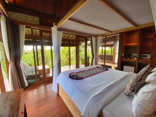 Peliatan Kabine | Suite Room with AC ,surrounded by ricefield By iLys Collection