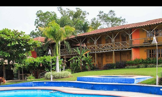 Quimbaya Haus | Suite With Hamaca And Balcony In Front Of Panaca