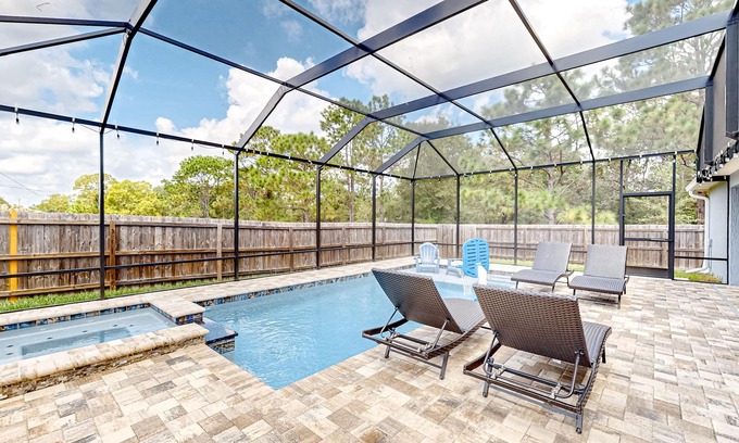 Summerfield Haus | Summerfield home with a fenced-in yard, pool, hot tub, & games