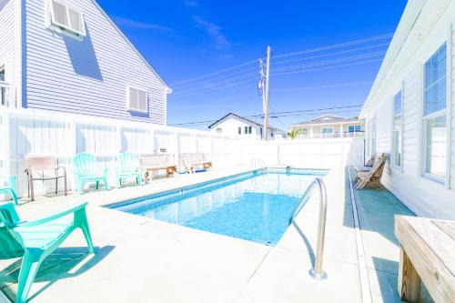 Cherry Grove Beach Haus | Suns Out Steps to Beach w Private Pool in Cherry Grove