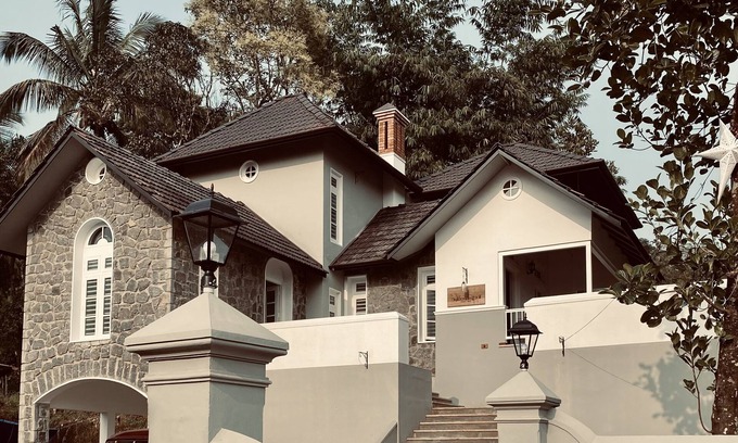 Vythiri Haus | "Thalimala Bungalow, Experience A Vintage Colonial Charm in a Tea-Scaped Haven"