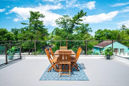 Traverse City Haus | The Perch 14 on Front 2BR Private Hot Tub Patio Downtown Walks