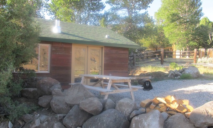 Wapiti Kabine | Die Remington - Yellowstone und Cody Cabin mit spektakulärer Aussicht.