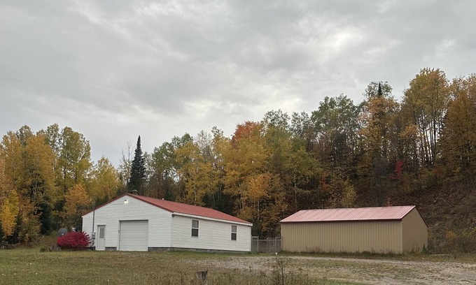 Wolverine Haus | The snow has arrived! Cook’s Getaway across from Snowmobile Trails